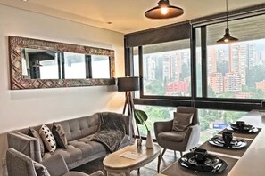 Appart'hôtel Deluxe | Coin séjour | Télévision LCD