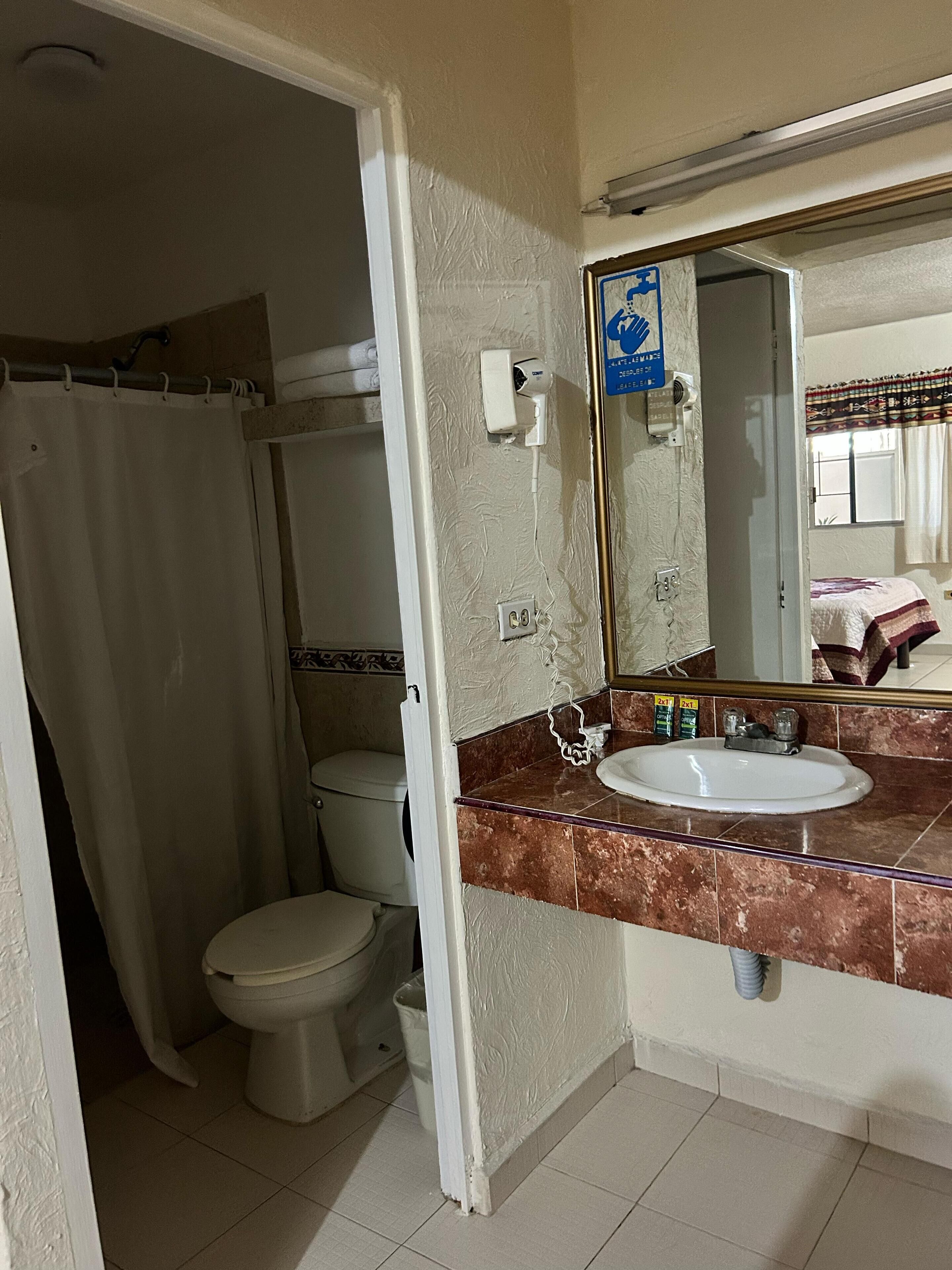 traditional double room | bathroom | shower, rainfall showerhead, free toiletries, towels