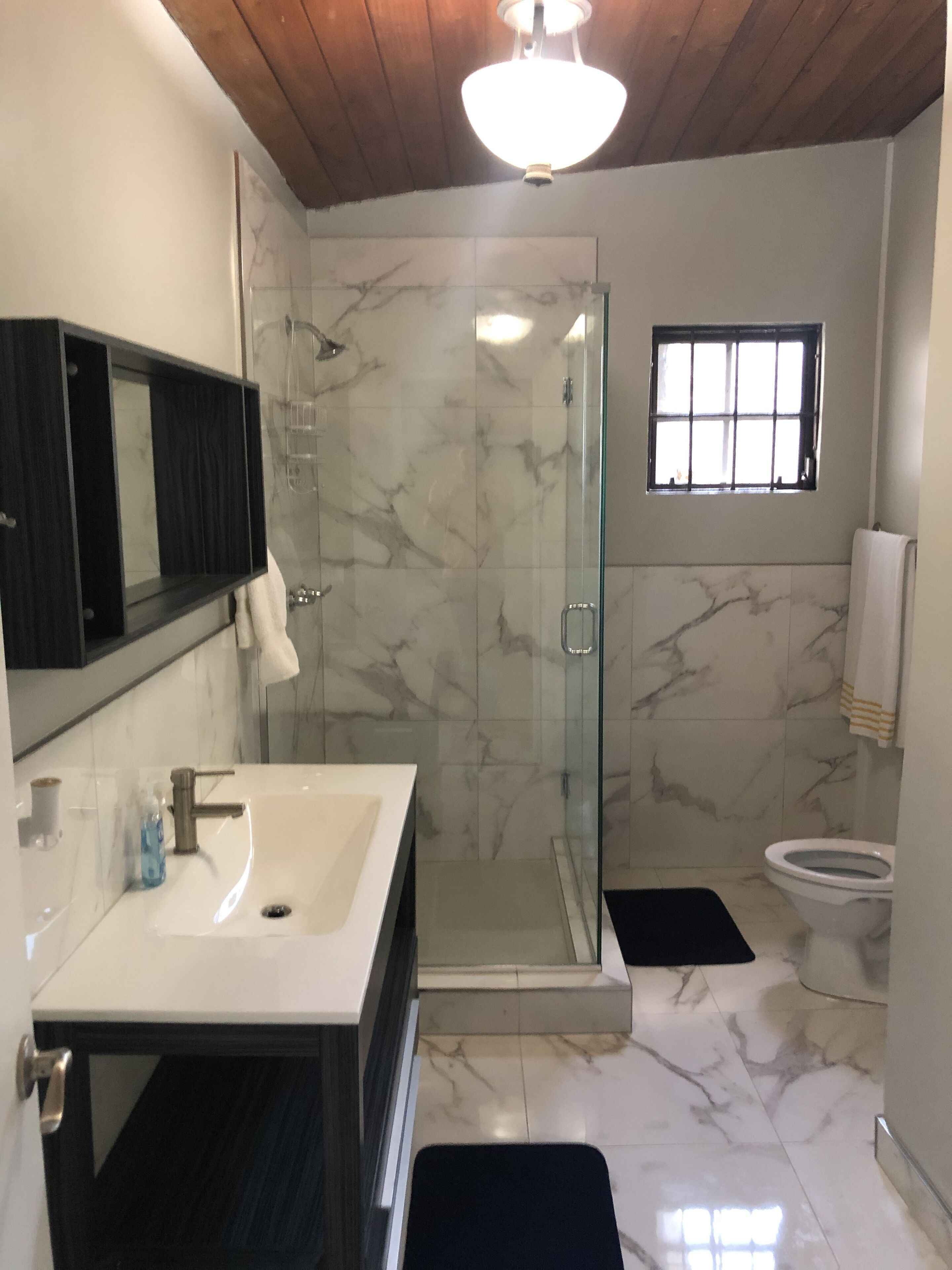 Comfort Apartment | Bathroom | Shower, slippers, towels