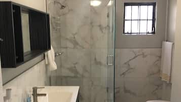 Comfort Apartment | Bathroom | Shower, slippers, towels