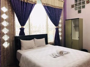 Deluxe Room | Free WiFi, bed sheets - Trivadoh Syariah Hotel (Padang Panjang)