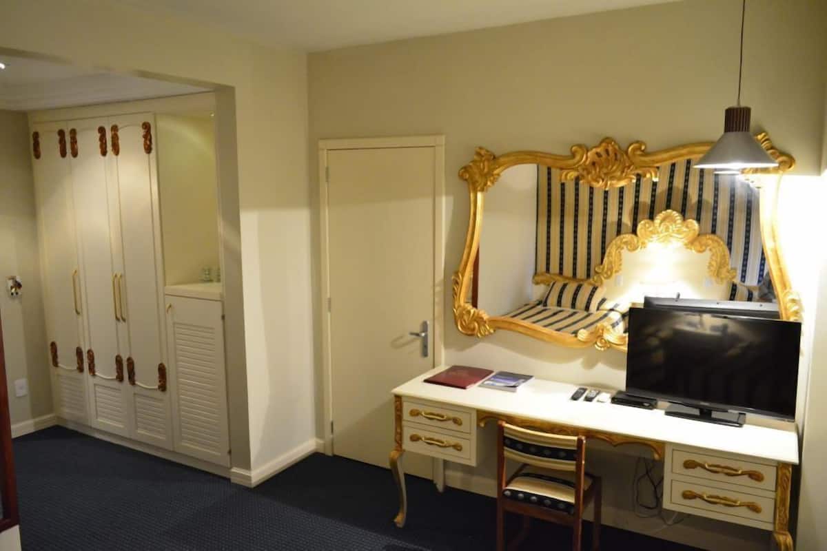 hair dryer, bathrobes, slippers, bidet