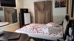 Suite (Diamante) | Minibar, wi-fi (inkludert) og sengetøy