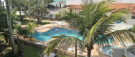 Outdoor pool, open 8:00 AM to 8:00 PM, pool umbrellas, pool loungers