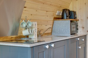 Fridge, microwave, cookware/dishes/utensils
