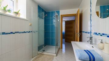 Bathtub, hair dryer, heated floors, towels