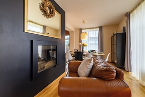 Smart TV, fireplace, books