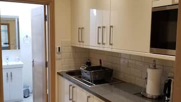 Fridge, microwave, toaster, cookware/dishes/utensils