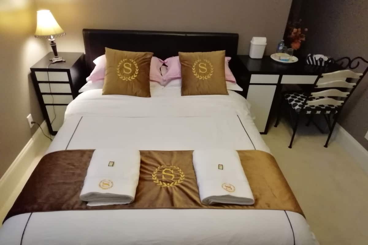 2 habitaciones, ropa de cama de alta calidad y edredón