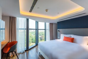 Suite, 2 slaapkamers | 1 slaapkamer, luxe beddengoed, donsdekens, een kluis op de kamer