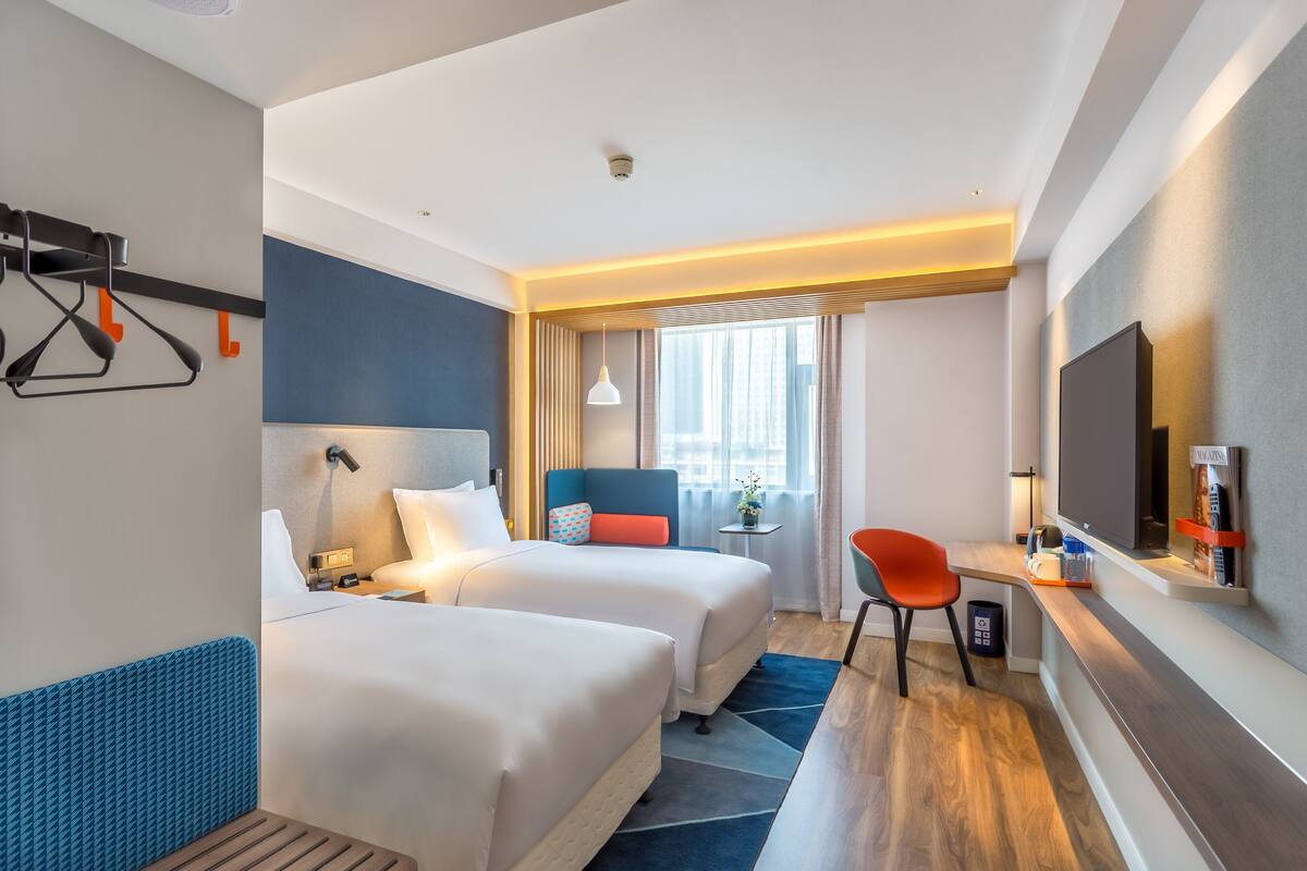 Premium bedding, down comforters, in-room safe, desk