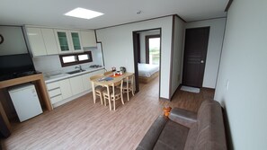 Room, 1 Bedroom (15 PY) | Living area | Flat-screen TV