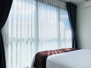 Apartment, 3 Bedrooms | In-room safe, desk, soundproofing, iron/ironing board - Glenwood Suites (Ho Chi Minh City)