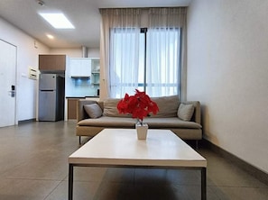 Apartment, 2 Bedrooms | Living area | Flat-screen TV