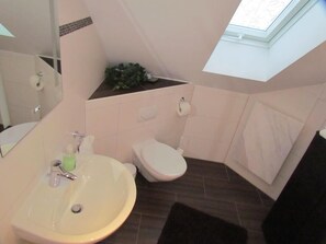 Hair dryer, towels, soap, toilet paper