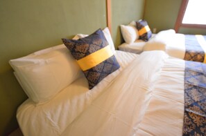 A hotel room with a bed, pillows, and a window. - Private room ROSSO (Osaka)