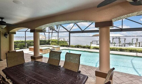Cozy riverfront home w/ panoramic views, private pool/spa & dock!