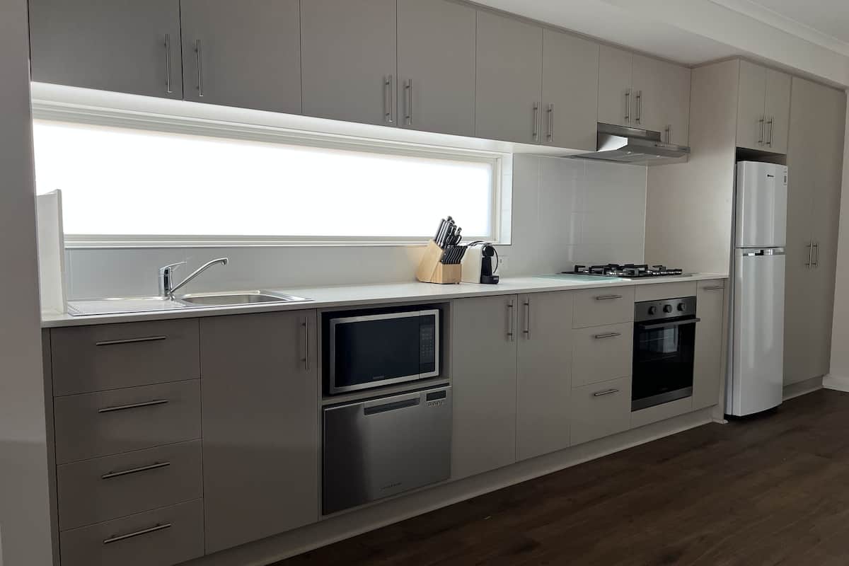 premium chalet | private kitchen | full-sized fridge, microwave, stovetop, coffee/tea maker