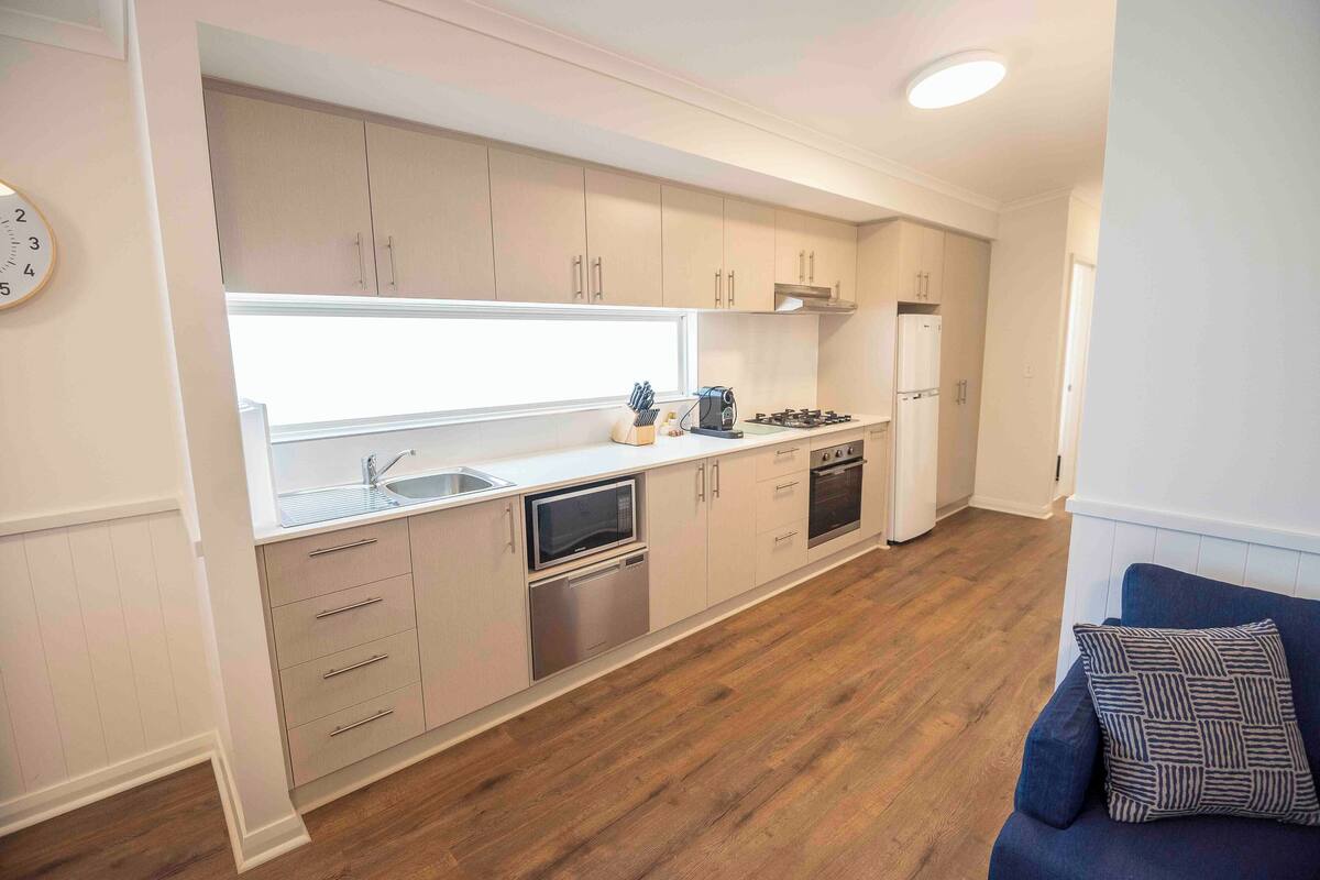 premium chalet | private kitchen | full-sized fridge, microwave, stovetop, coffee/tea maker