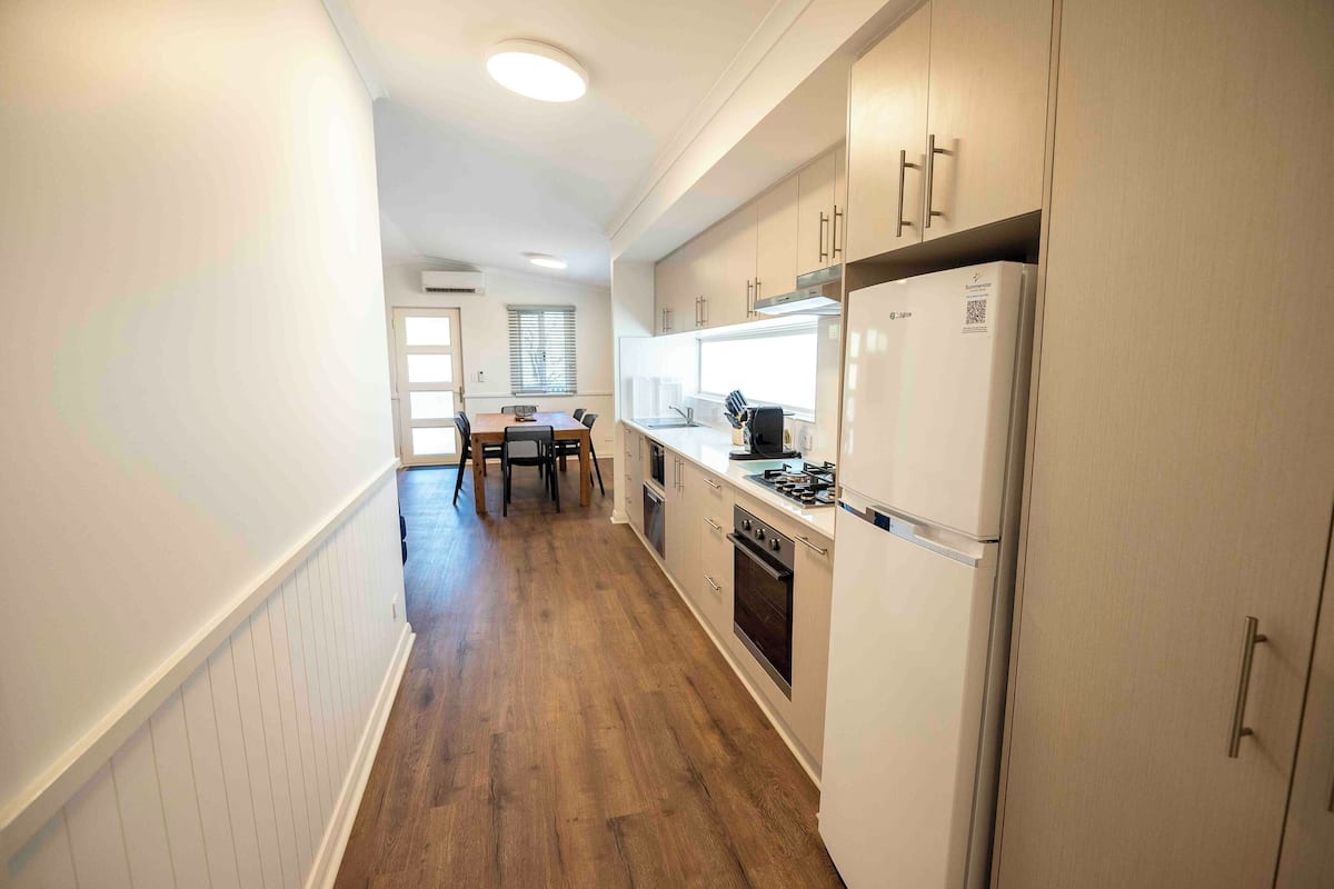 premium chalet | private kitchen | full-sized fridge, microwave, stovetop, coffee/tea maker