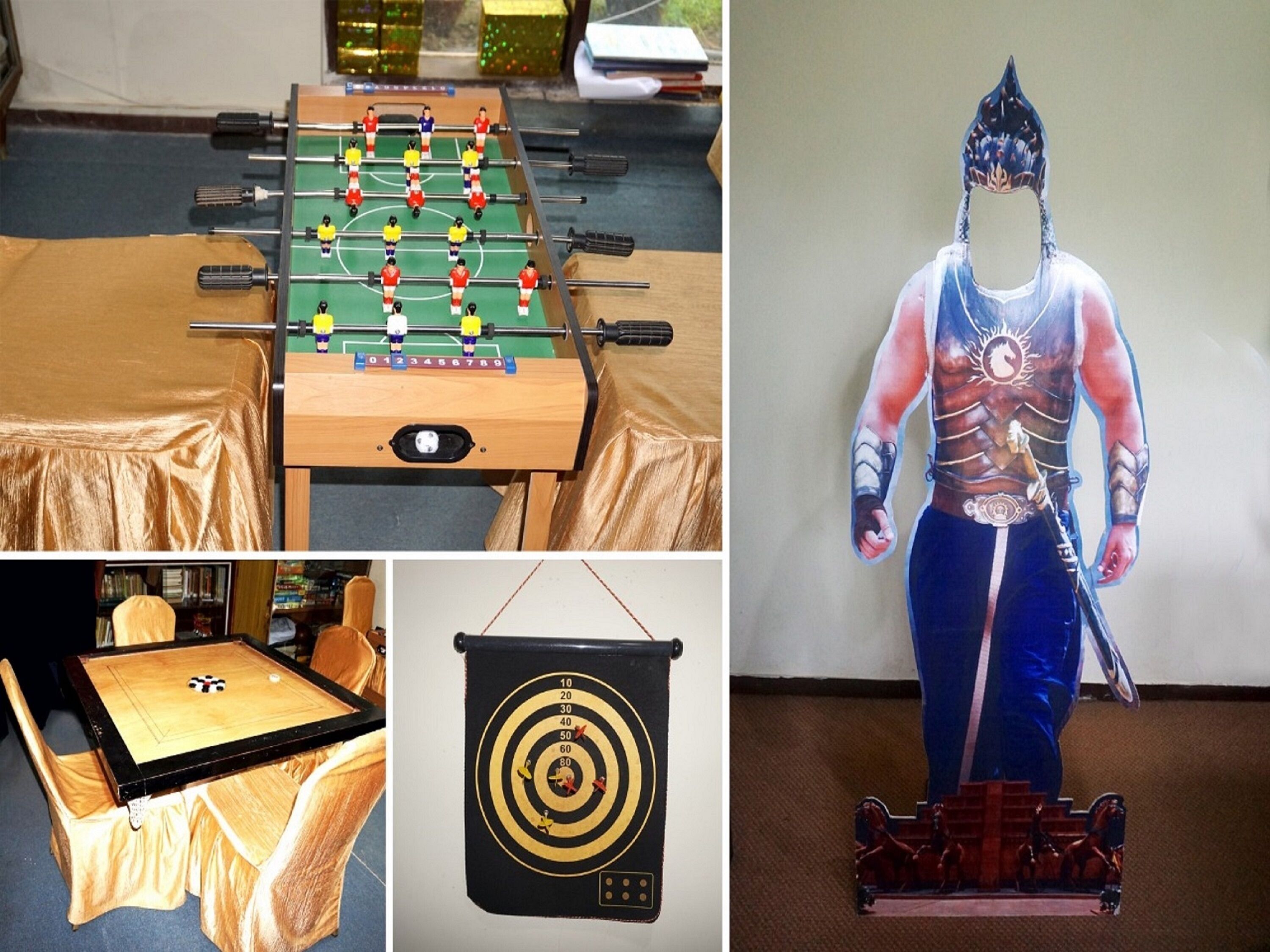 Una mesa de fútbol de mesa, un dardo y una estatua.