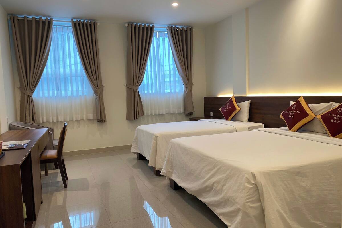 deluxe triple room | 1 bedroom, minibar, desk, laptop workspace