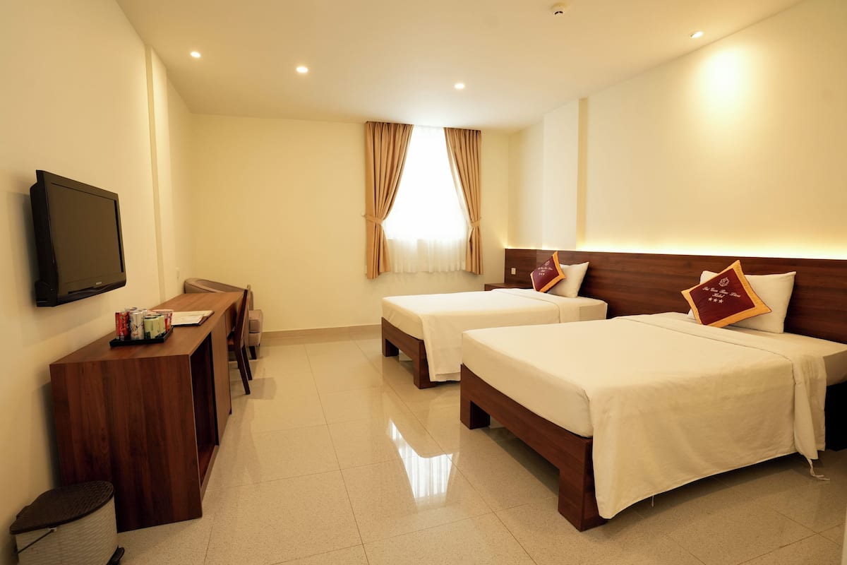 TvÄbÀddsrum Deluxe | 1 sovrum, minibar, skrivbord och arbetsyta för laptop