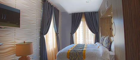 Apartemen, 2 kamar tidur (Ruby) | 2 kamar tidur, seprai katun Mesir, dan seprai premium