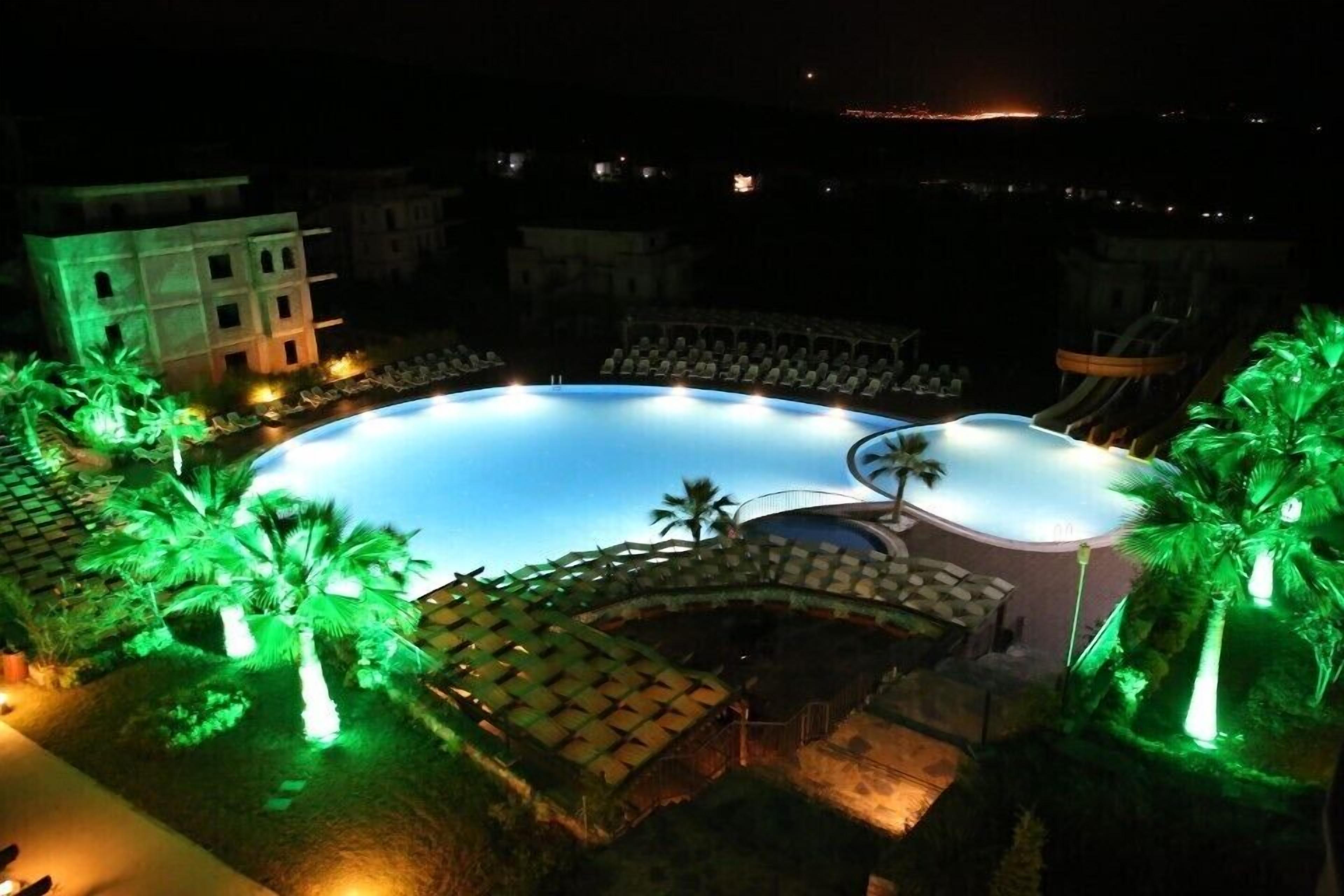 indoor pool, outdoor pool, pool loungers