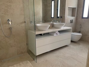 Villa | Bathroom | Hair dryer, towels, toilet paper