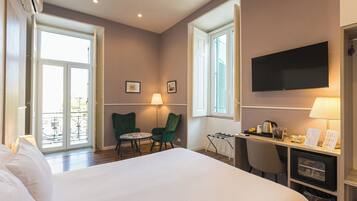 Suíte | Frigobar, cofres nos quartos, individualmente decorados, escrivaninha