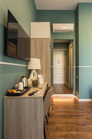 Minibar, in-room safe, individually decorated, desk