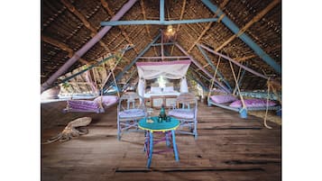 Deluxe Bungalow, Beach View, Beachfront | In-room safe, desk, soundproofing, rollaway beds