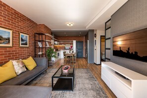 Luxury Apartment (Arum Lily) | Living area | Smart TV - The Rosebank Collection (Johannesburg)