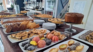 A buffet table with various pastries and desserts. - Biancopineta B&B (San Salvo)