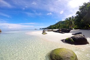 On the beach, white sand, snorkeling