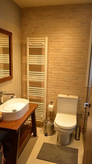 Villa | Bathroom | Separate bathtub and shower, hair dryer, towels, soap