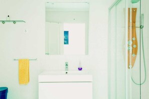Hair dryer, towels, soap, shampoo