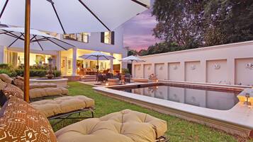 Outdoor pool, pool umbrellas, pool loungers