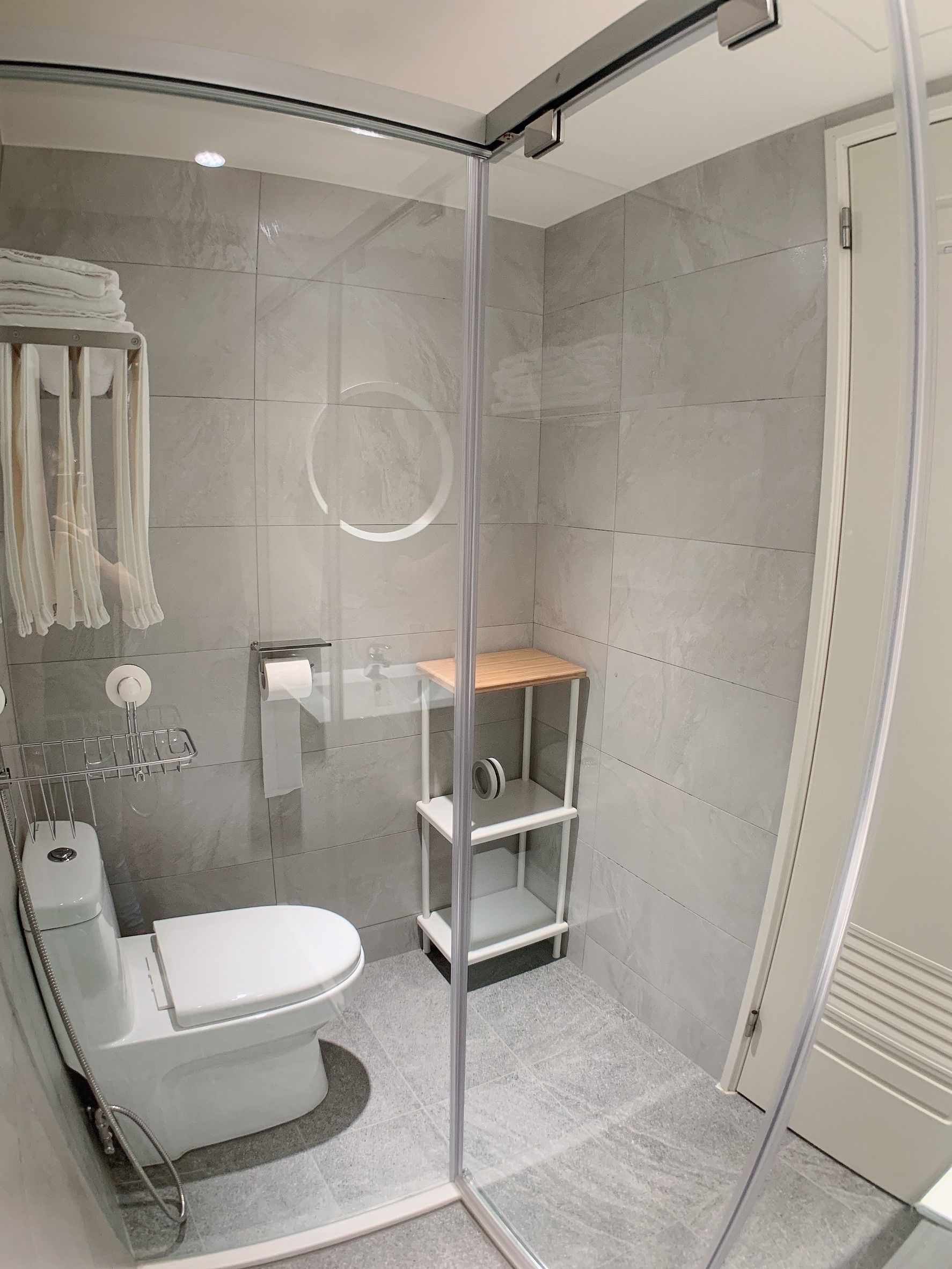 family suite | bathroom | shower, free toiletries, hair dryer, slippers