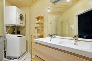 Shower, eco-friendly toiletries, hair dryer, slippers
