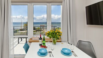 Apartment (Bay View 2) | Living area | Flat-screen TV