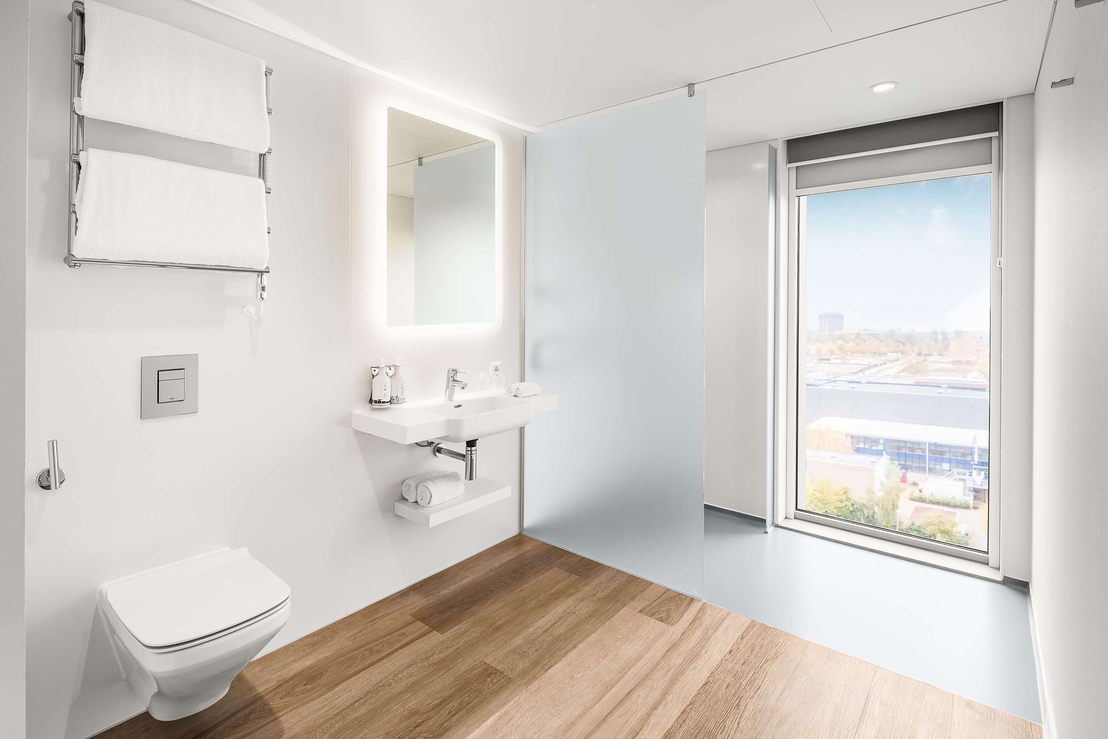 first class room | bathroom | shower, rainfall showerhead, free toiletries, hair dryer