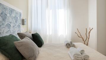 Apartment, 1 Bedroom, Balcony (Dionisio) | Iron/ironing board, free WiFi, bed sheets