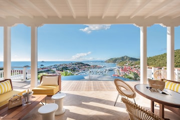 Chic suite interior with terrace overlooking Gustavia