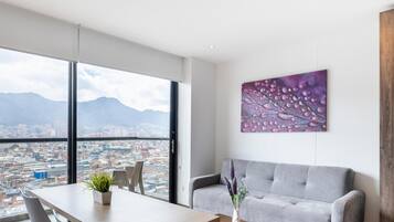 Apartment | Living area | 43-inch Smart TV with cable channels, foosball, table tennis