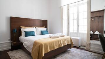 Family Apartment, 2 Bedrooms | In-room safe, individually decorated, desk, laptop workspace