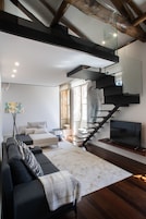 Appartement majestueux, 3 chambres | Aire de séjour