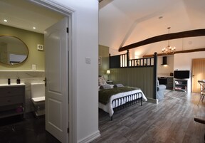 Cottage, 1 Bedroom | 1 bedroom, individually decorated, individually furnished, desk