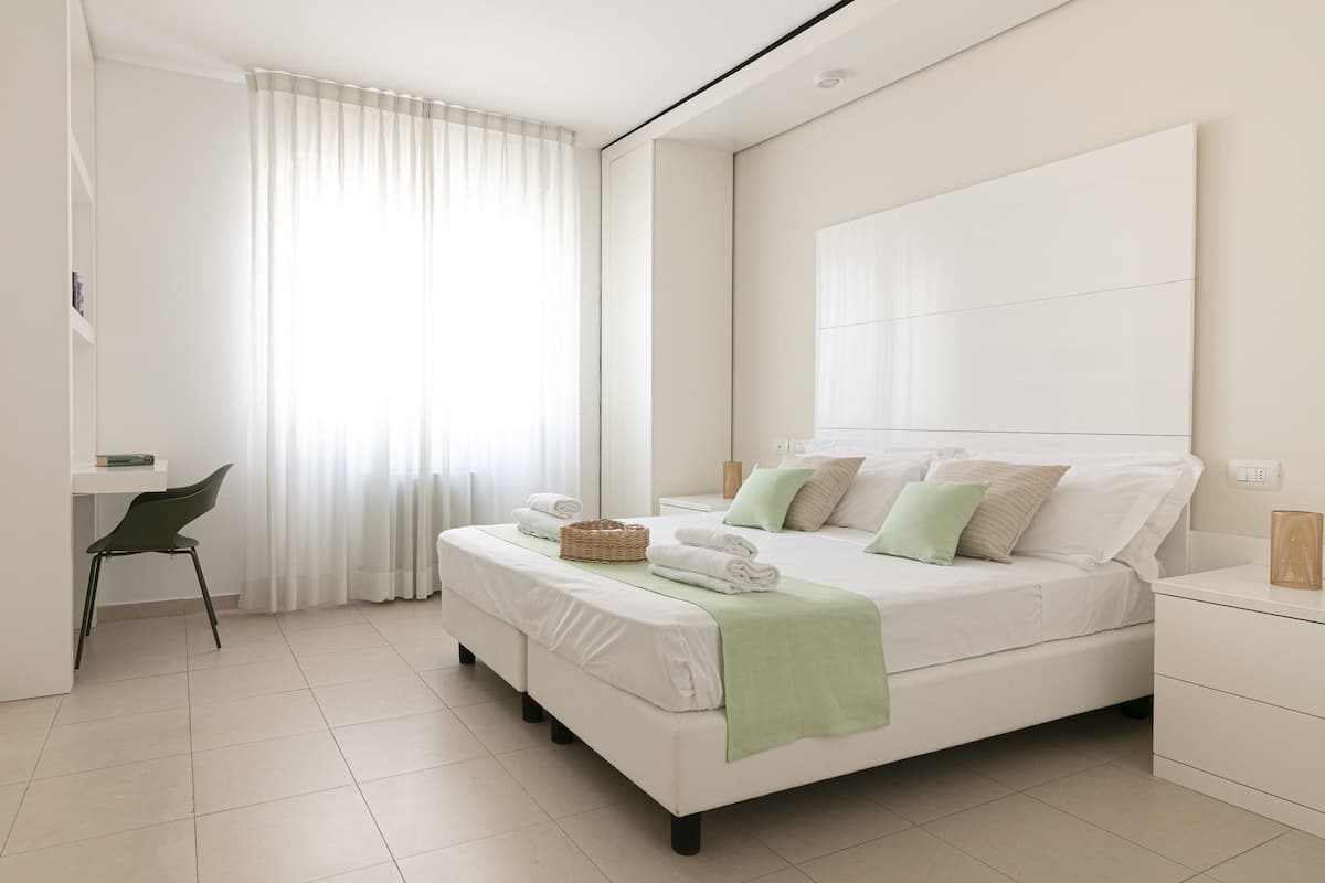 Apartment, 1 Bedroom (Stella Marina) | 1 bedroom, laptop workspace, free cribs/infant beds, free WiFi